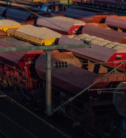 Cargo trains filled with sand and rocks