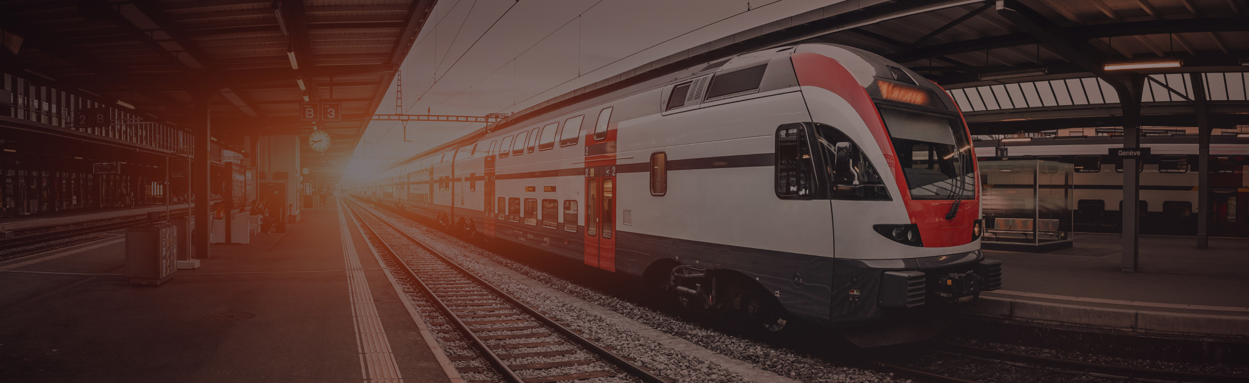 Engineer uses a tablet to inspect and analyze the route of a networked train information system before releasing the train from a major station junction. modern industry and transportation.