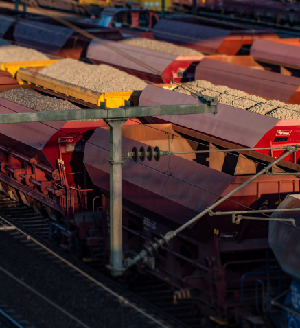 Cargo trains filled with sand and rocks